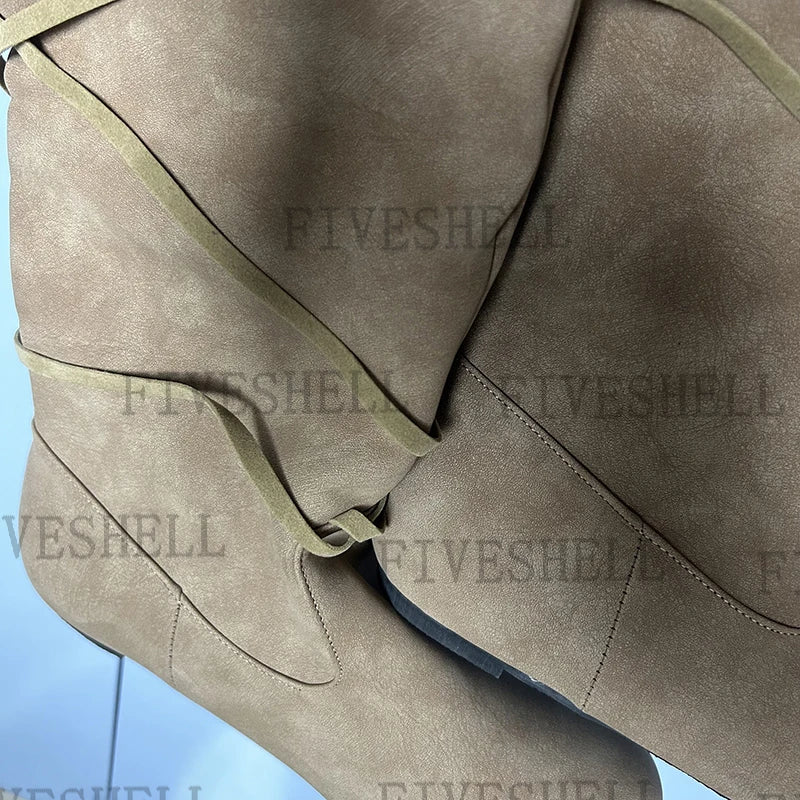 The Wanderer’s Boots – Pathwalker Leatherbound Footwear